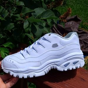 Clean white Sketchers sport athletic shoe